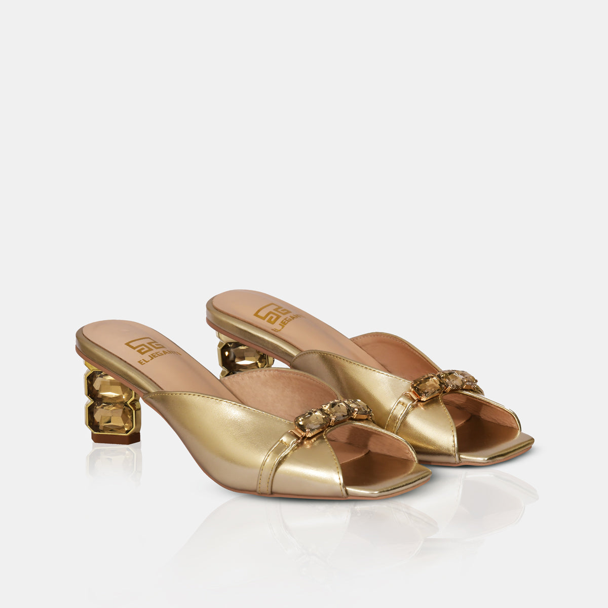 MALLIKA IN GOLD